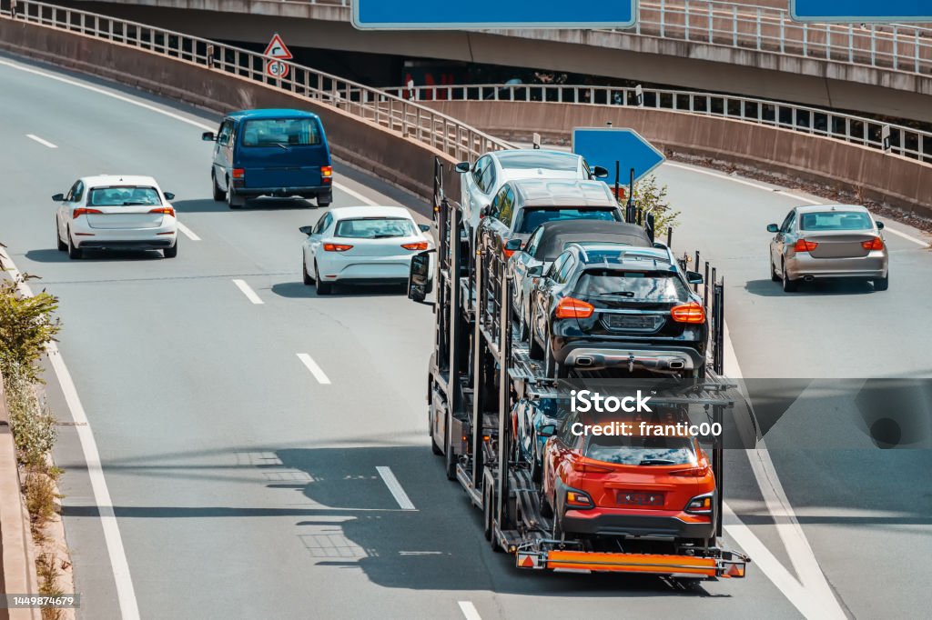 transporter with cars as cargo.